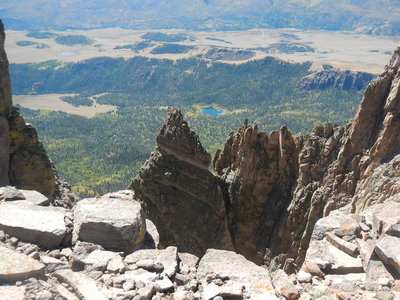 Looking past pinnacles on the Bristol Head escarpment to the valley floor thousands of feet below.
