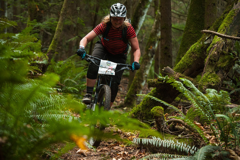 Gretchen Nelson thoroughly enjoying the exit off the Upper Ridge Trail