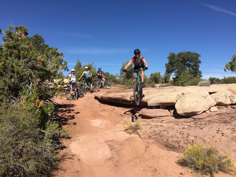 Showing others how it's done at Dead Horse Point.