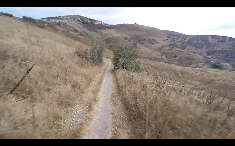 The singletrack is fast and smooth throughout most of the trail.  During the wetter months, the terrain is usually laced with fields of green grass and shrubs. This pic was taken in July of 2015 and the So. Cal drought is extremely noticeable.