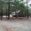 The entrance to Hall Trail off Engle Rd is to the right of the camp; gate is way in the background.