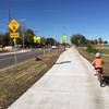 Connection to the Red Bud trail!  The lights for crossing Woodlawn are NOT stoplights, only warning lights. Use caution.