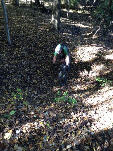 Shawn riding through a Pittsburgh Pothole along Kennywood.