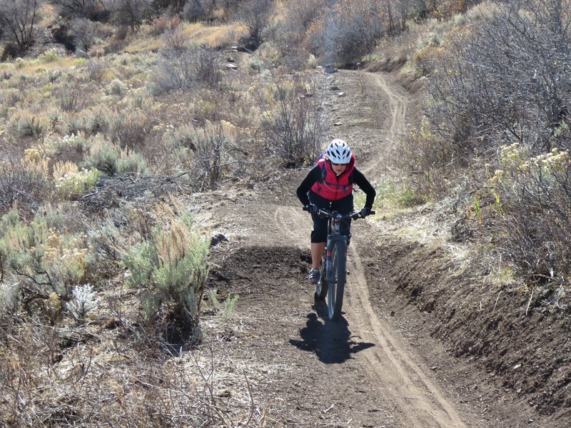 A mini table top is one of many skill building features along the trail.