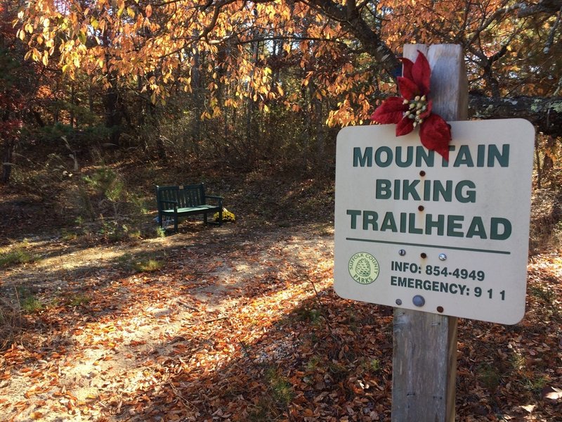 The trailhead is located at the Ross Hansen memorial park bench.