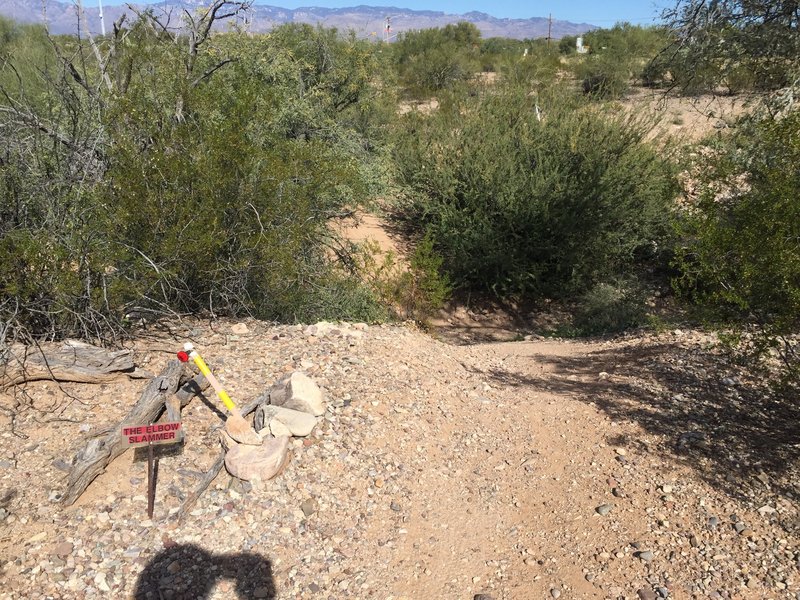 Steep entrance to this obstacle with a surprise double dip.  Watch those elbows though.