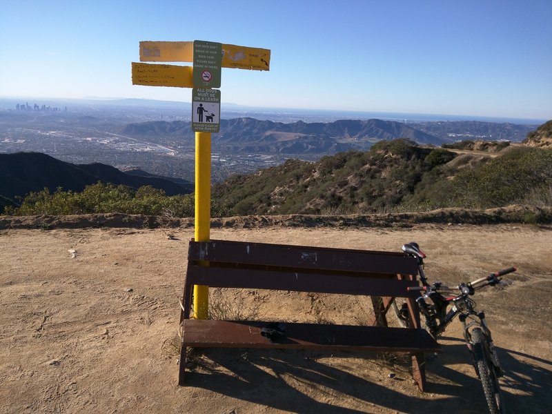 The park bench close to the top.