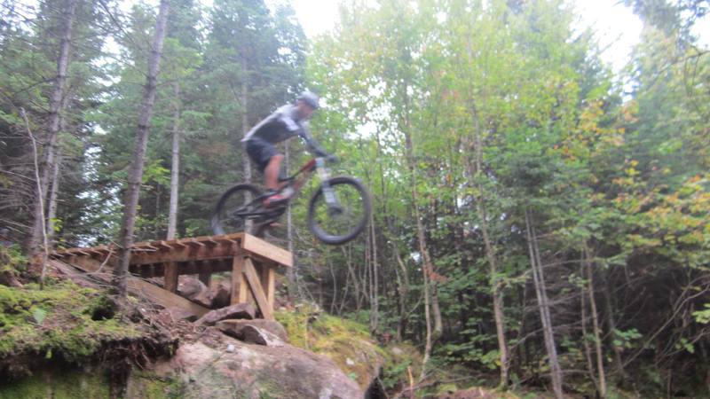 Catching air from the big drop while riding Léon.