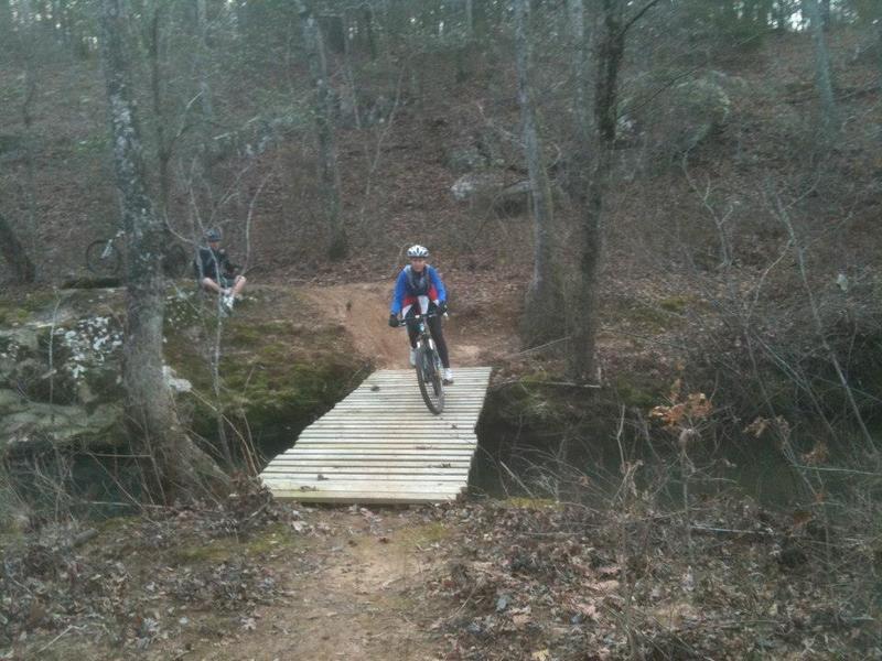 Tanya Lercher crossing Steve's Bridge on her way to the Northeast Loop.