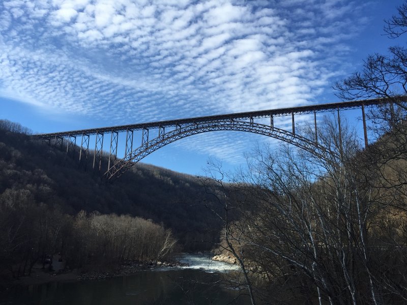 View of the New River Gorge Bridge from Fayette Station Road. If you head east (river right) from this point and climb up the road (against traffic) the trail will be on your left off of a gravel road.