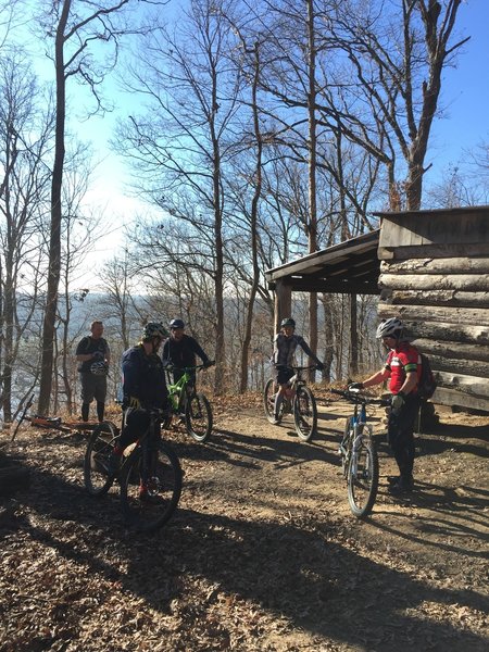 The Ohio River overlook on the Adventure Hiking Trail. 
<br>
The pictured cabin is available for lunch and for camping if you wish to enjoy a great view.