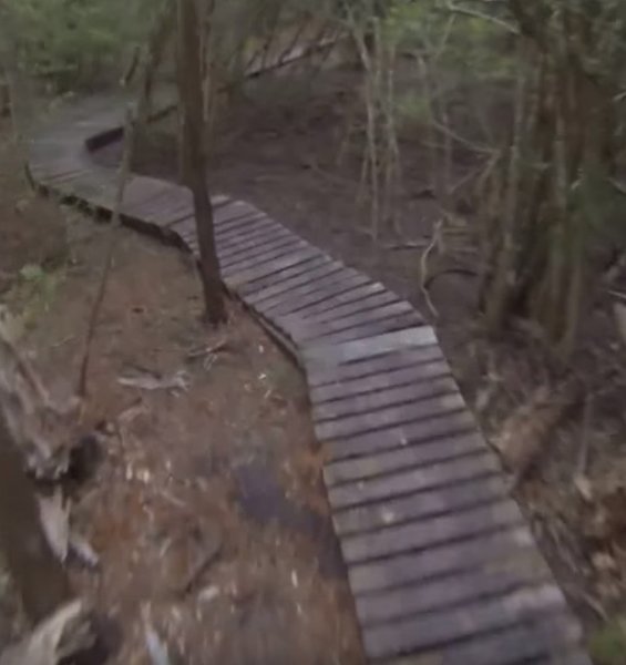 Typical wooden elevated "bridges" over a soft soil area at Jack Brooks.