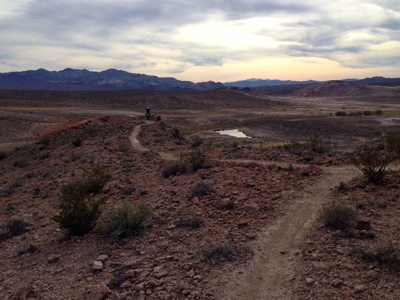 Dynamite overlooking Spicer Ranch with the 95 HWY Beatty, NV in the distance.