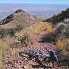 Steep descent with east El Paso in the background.