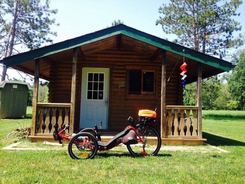 Cabin with firepit at trailhead.