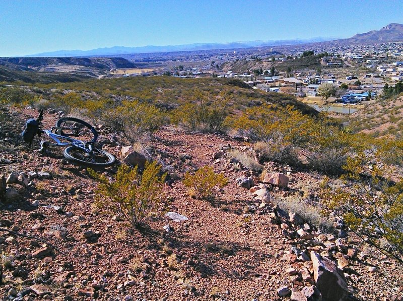 Tight switchback with Truth or Consequences in the background