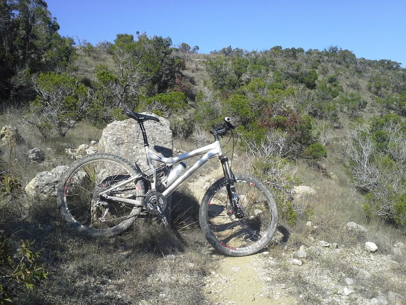 The 2006 SWorks Stumpjumper along a flowing and hill hugging section of the Lakeway AKA LAME Trails.