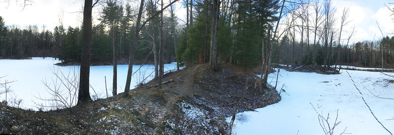 Advanced trail on ridge between two small lakes.