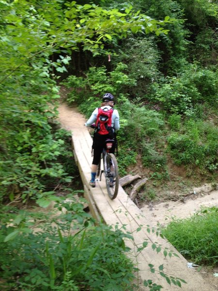 Locals call this bridge "Three Plank." Walking it is advised.