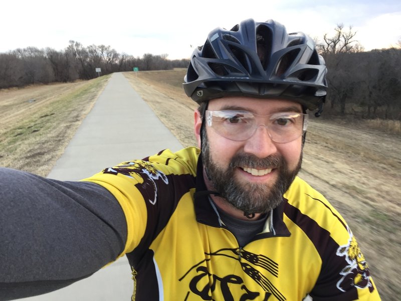 This is a great path, a perfect opportunity to take the kids and teach them to ride away from traffic.  When they get confident with their skills, you can drop down into the woods on the trail!