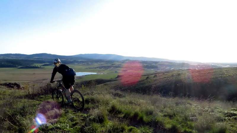 Starting the DH portion of the trail with great views.