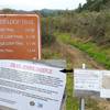 Enchanted Loop junction with close-up of trail work sign.