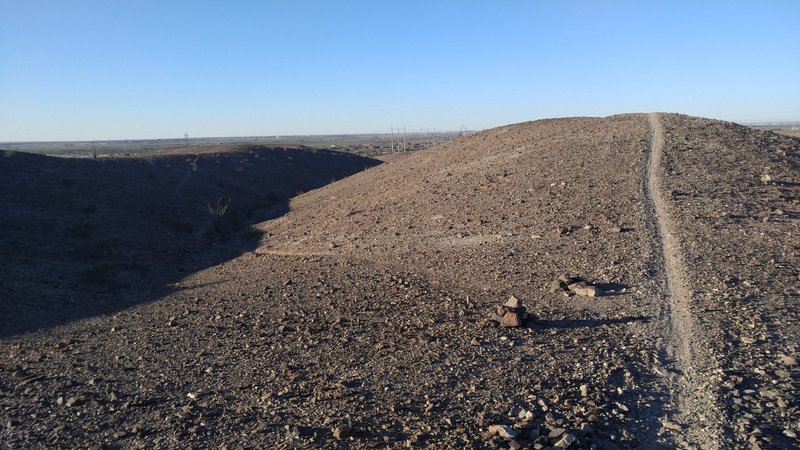 Looking west on Moab. To the left,an unnamed trail that connects to the adjacent, also unnamed trail on the next ridge.