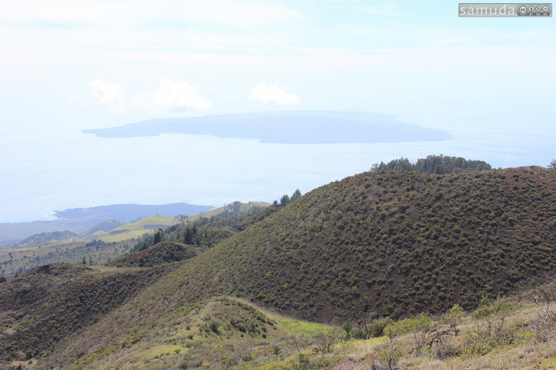 Ridge line view with Kahoʻolawe in the distance.