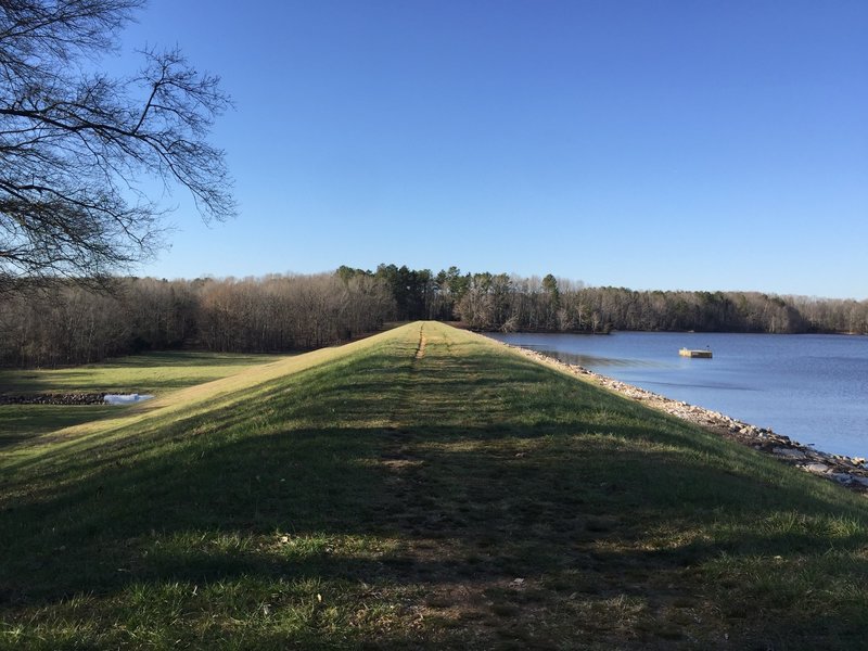 A scenic ride along the top of the earthen dam.