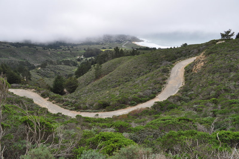 Section of Pedro Mountain Road with Montara Beach in the distance.