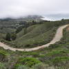 Section of Pedro Mountain Road with Montara Beach in the distance.