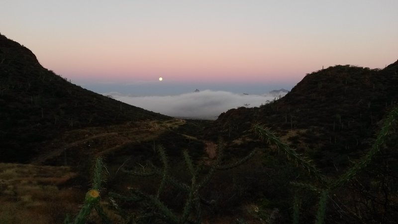 Ocean view, blocked by clouds.