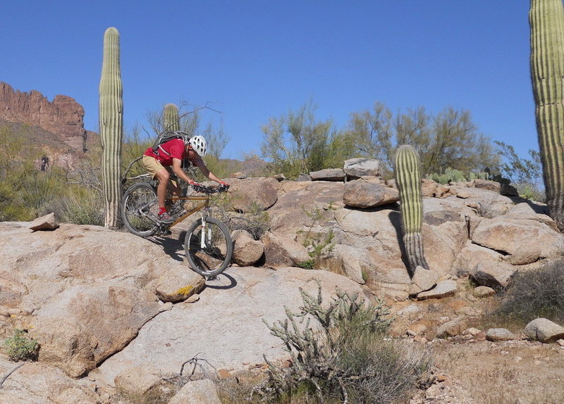 Heading down some big rocks.