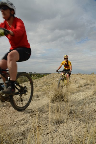 Riders enjoying Laurie's Bench on the west side of Sunset Mesa.