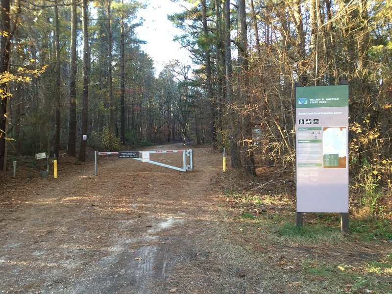 Reedy Creek Road / Trenton Road intersection gate entrance to Umstead State Park.