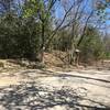 Grasshopper Trailhead at Westlake Road and 74th Street, take a right on a gravel road. This dead ends at the abandoned campground entry. Park alongside the road's edge and not in the road.