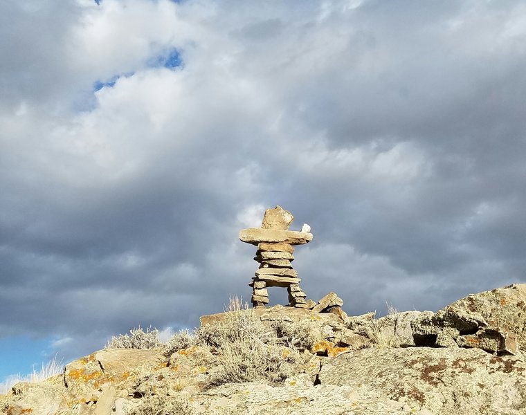 The "Rock Man" goes through many iterations as the winds he is exposed to take their toll. The trail wraps around the knob he stands guard over.