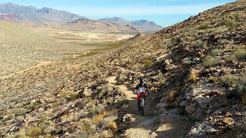 If you ride this the right way, you'll have a permanent grin, hence the name Perma Grin trail but obviously we're headed wrong way!