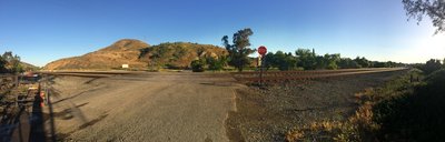 Cross the tracks to get to the Scully Trailhead (left) OR continue straight (through the closed metal gate - you can open it, remember to close behind you) on SART to get to Lower Aliso Canyon trailhead.