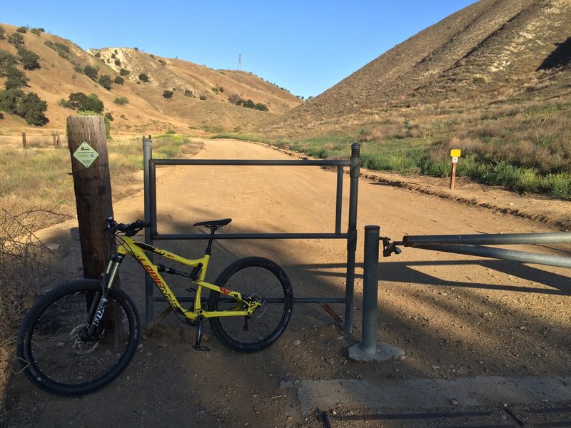 Entrance to Lower Aliso Canyon Trail. (You'll cross two closed metal gates - you can open them, remember to close behind you -  if you are coming from Green River Golf Course on the SART).