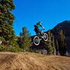 Rider Tait Trautman gets a boost on the Buffalo Drop trail at Grand Targhee Bike Park in Alta, WY. 
<br>
Photo: Dana Ramos - Instagram: @dnasince1979