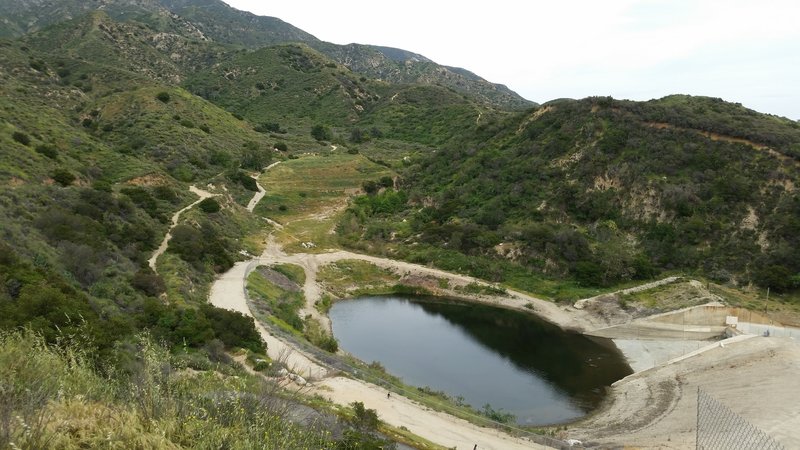 Looking down on Haines Canyon Reservoir at the start of the downhill on the Gateway to the Rim of the Valley Trail.