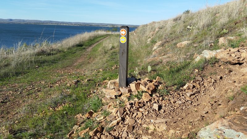 West end of the Orange Loop at the dam switchbacks. Climb the switchbacks and head east.