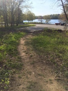 Trailhead at Plugs Beach parking area.