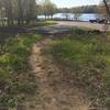 Trailhead at Plugs Beach parking area.