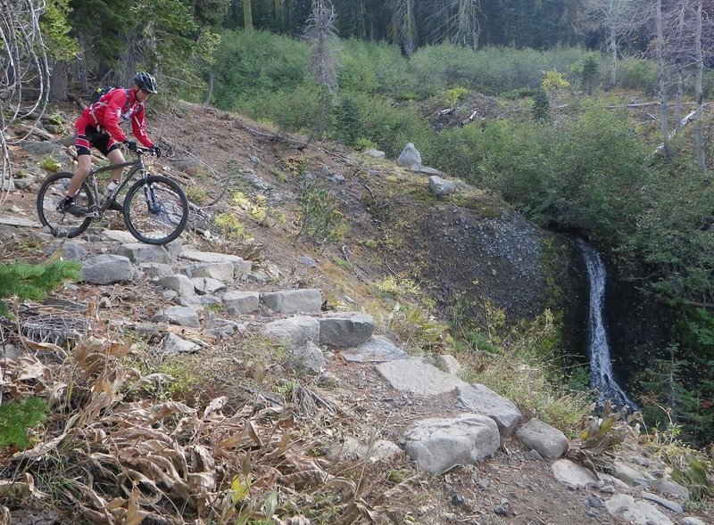 Did I mention the steps? Kevin Joell (TAMBA president emeritus) rides the waterfall steps on a hardtail.