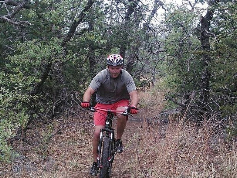 The coach cruising through the Hoof Gullies at Lawtonka Trails.