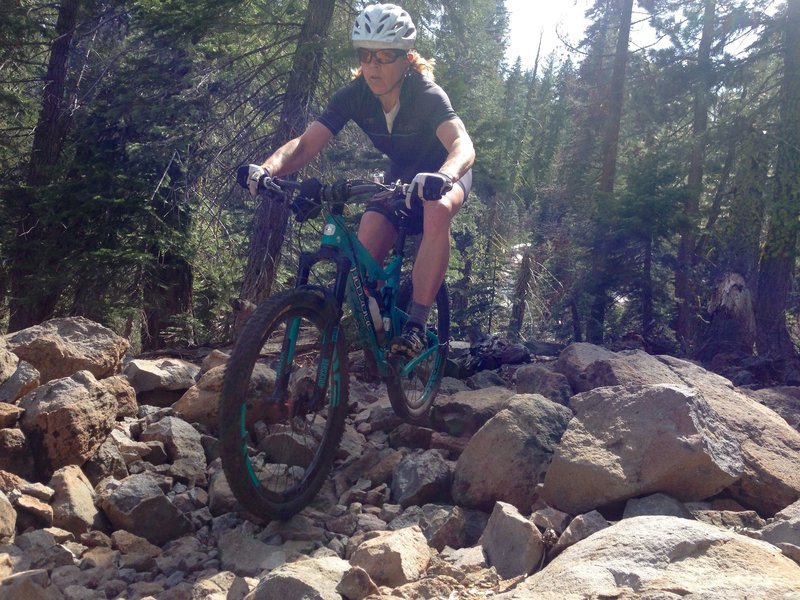 Girl flowing the rocky section.