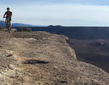 Wheelie at the cliff edge.