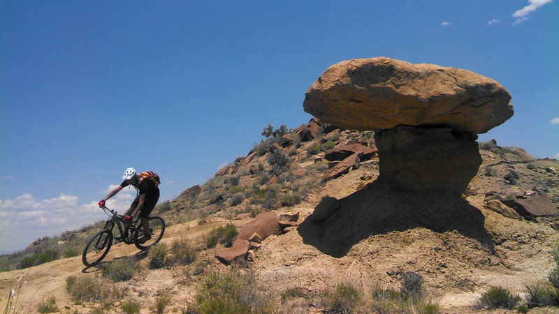 Trail wrapping around a hoodoo